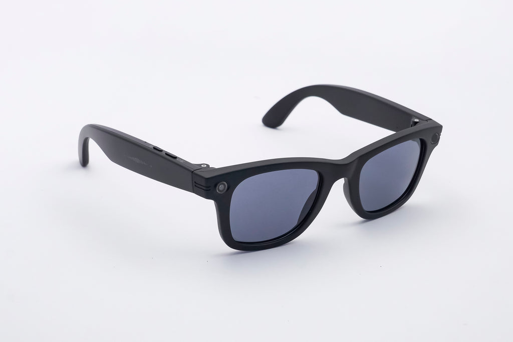 POV One smart sunglasses — front view, matte black frame with camera