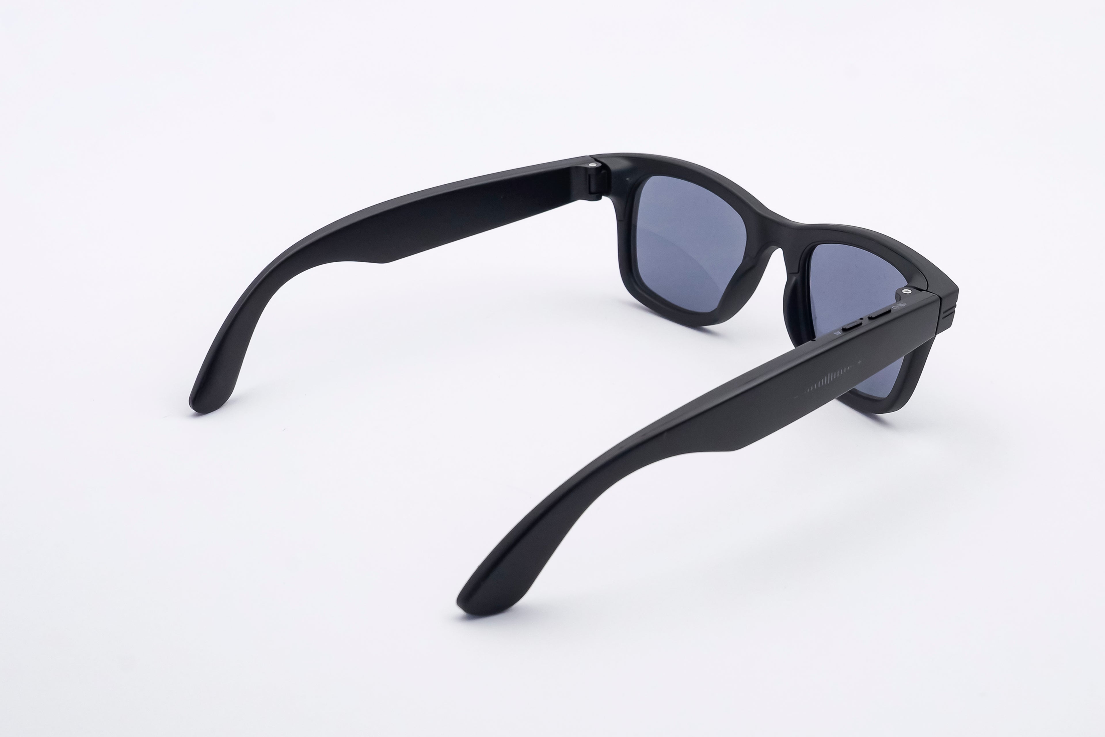 Man wearing POV One smart sunglasses outdoors